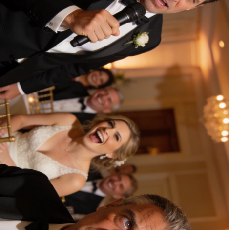 At my stepdaughter’s wedding, they turned my name into a punchline during the toast. “He’s just the useless stepdad who never did anything.” The room erupted—friends, family, even my wife laughed like it was harmless. I sat there smiling with my jaw clenched, holding my glass so steady you’d think I felt nothing. Then the groom stood up, reached for the microphone, and the laughter died before he even spoke.